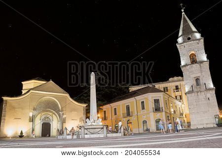 Benevento Italy - 01 Augut 2017: Church of Santa Sofia and its bell tower on the night of August 01 and people walking