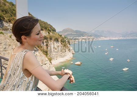 A Elegant woman overlooking the Amalfi Coast