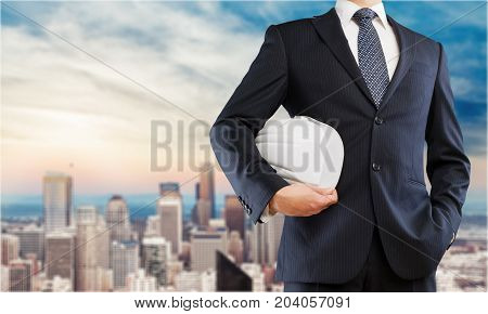 Business holding man helemet business success white solid