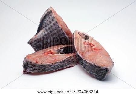 Slice Raw Fish From Fresh Meal On White