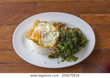 Crispy Basil Herb Pork And Egg  With Fried Egg