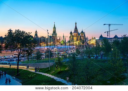 Saint Basil's Cathedral in Red Square and Kremlin from New Zaryadye Park in Moscow sunset view
