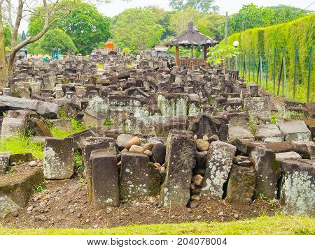Close up of pile of rocks outside of Prambanan temple near Yogyakarta on Java island Indonesia.