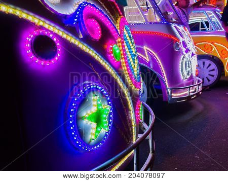 JOGJA, INDONESIA - AUGUST 12, 2O17: Close up of a traditional pedicap transport parket at outdoor with colorful and bright lights at night at jogja Yogyakarta Indonesia.