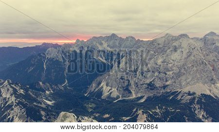 Aerial view of mountain ridge at dawn. Julian Alps in Slovenia.