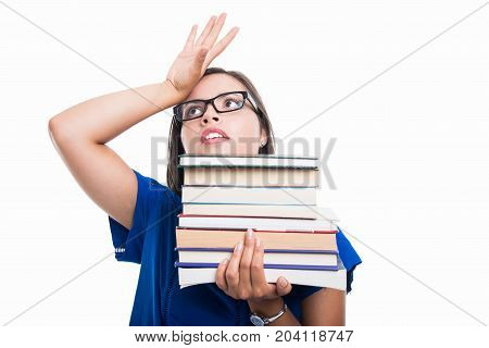Portrait Of Student Girl Holding Books Looking Exhausted