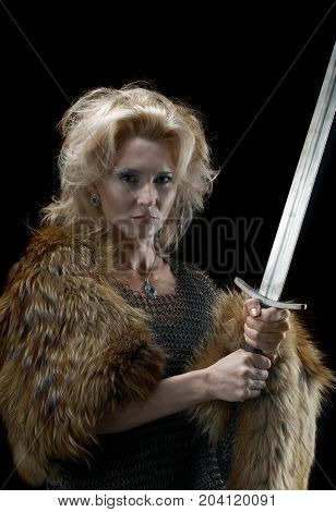 ancient  medieval Valkyrie. Viking girl with sword