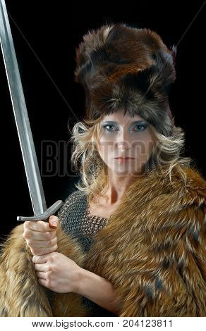 ancient  medieval Valkyrie. Viking girl with sword