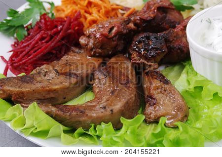 grilled blets and vegetables , close up meal
