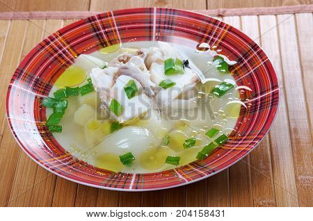Ukha. Russian home traditional fish soup. Studio  close up meal