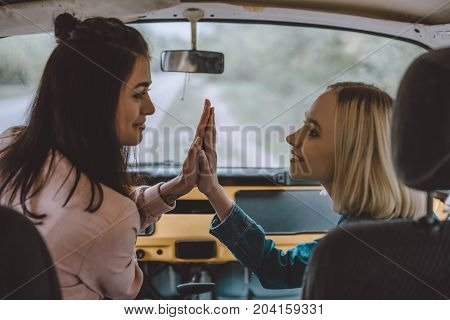 Girls Giving Highfive