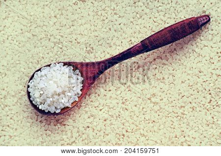 Clean White Rice In A Wooden Spoon