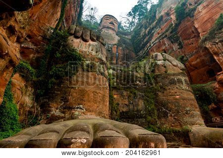View of the Buddha statue in Leshan, China. Leshan Buddha is the world's largest statue of Buddha, whose height is 71 meters.