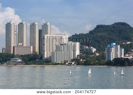 Building and sea in penang , malaysia .