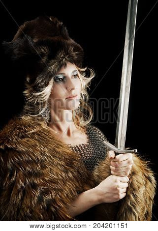 medieval Valkyrie. Viking romantic girl with sword