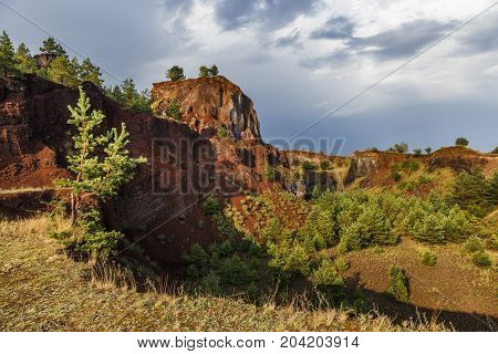 Abandoned career of red scorea rocks, alike grand canyon