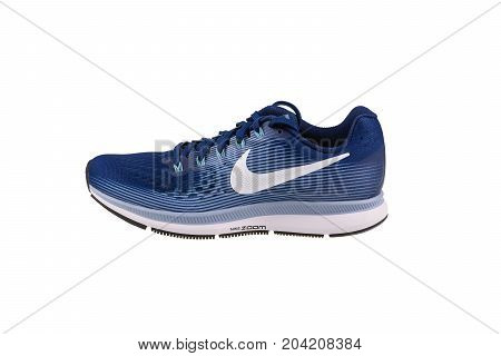 BURGAS, BULGARIA - SEPTEMBER 7, 2017: Nike Air Zoom Pegasus 34 Women's Running Shoes in blue isolated on white background. Nike is a global sports clothes and running shoes retailer.