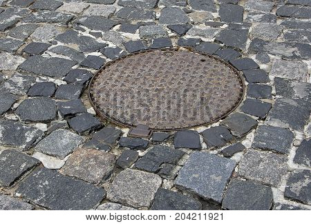 Manhole cover on street top view. sewer Cover the drain.