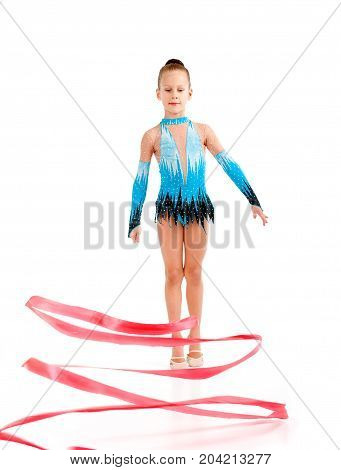 young girl doing gymnastics over white isolated,