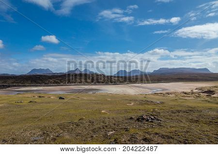 Achnahaird Bay with the mountains of Inverpolly in the distance.