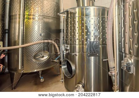 Modern winery plant with fermentaion stainless tanks for wine production