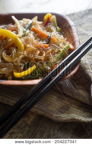Korean Japchae vegetarian stir fried cellophane noodles with vegetables