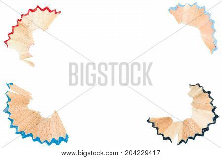 Shavings of pencils in the all corners of the image