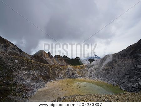 Sibayak Volcano Crater And Caldera Mountain Ridge, Sinabung Volcano On The Background.  Berastagi, N