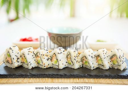 Homemade Sushi With Salmon, Omelet, Cucumber And Soft Cheese. Rustic Style