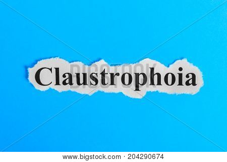 Claustrophobia text on paper. Word Claustrophobia on a piece of paper. Concept Image. Claustrophobia Syndrome