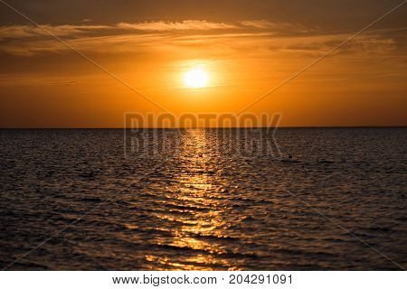 sunset at sea. dawn at sea. sunset over the water. the dawn of the sun above the water