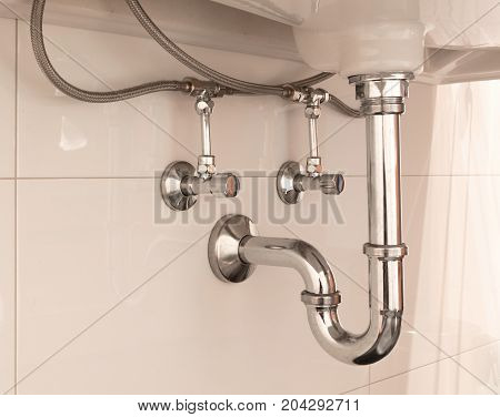 Basin Siphon Or Sink Drain In A Bathroom