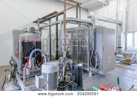 workshop with containers and tanks for the production of polyurethane. polyurethane technology