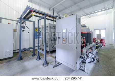 workshop with containers and tanks for the production of polyurethane. polyurethane technology