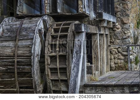 at the Falls is an old watermill by large wheel