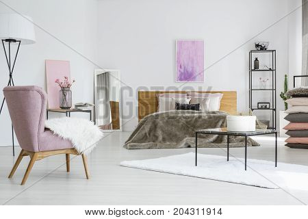 Bright Bedroom With Pink Artwork