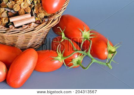 Tomatoes San Marzano, Campania, italy

Group of tomatoes San Marzano, bunch cluster, still life on gray-blue background