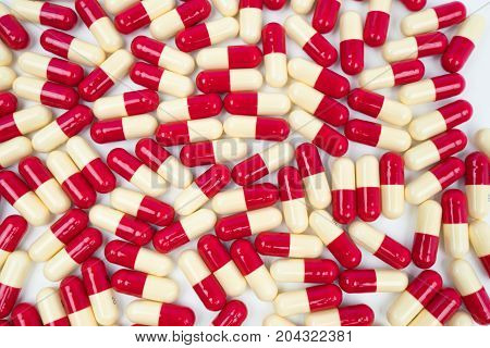 Colorful of antibiotic capsules pills isolated on white background drug resistance concept