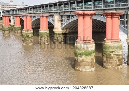 Red Pillars In The River Thames Between Blackfriars Road Bridge And Blackfriars Railway Bridge