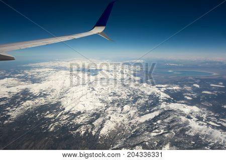 flying over california mountains in the spring