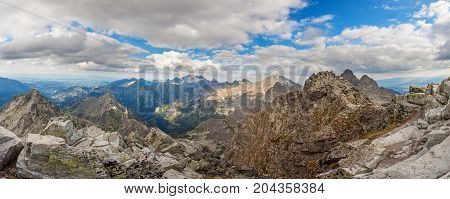 View on high Tatra Mountains from Rysy mountain with dramatic cloudy sky
