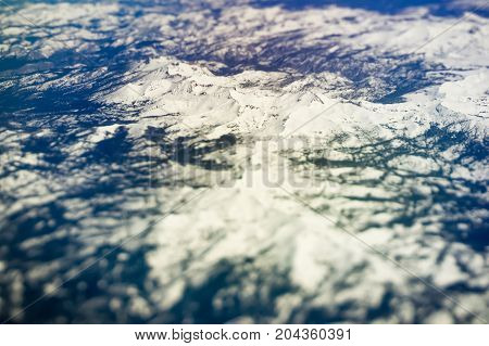 flying over california mountains in the spring