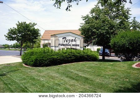 JOLIET, ILLINOIS / UNITED STATES - JULY 21, 2017: The Tezak Funeral Home offers funerary and mortician services on Plainfield Road.