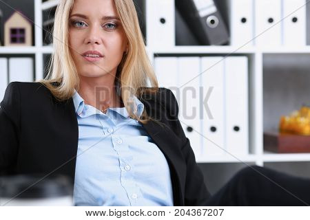 Business Woman Resting In The Office After A Working Day Throwing