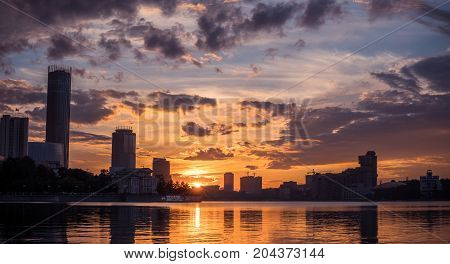 Yekaterinburg City Center On Sunset. City Pond View, Amazing Clouds And Sky. High Buildings, Skyscra