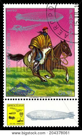 STAVROPOL RUSSIA - September 12 2017: a stamp printed by Paraguay shows Argentinian Gaucho air mail exhibition 