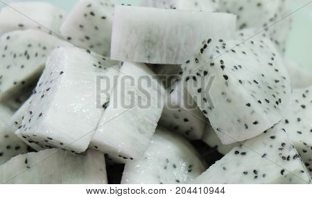 Fresh Fruits Background of Chopped Ripe and Sweet Dragon Fruits or Pitaya.