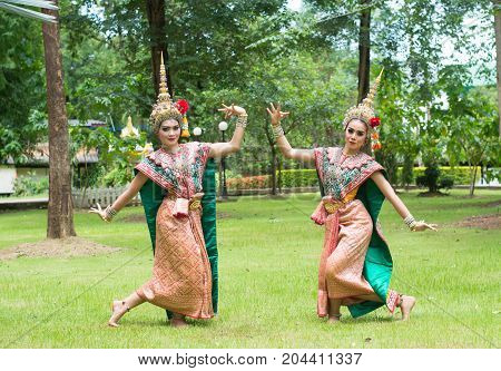 Thai traditional dress. Actors performs Thai ancient dancing Art of Khon-Thai classical masked ballet in Thailand