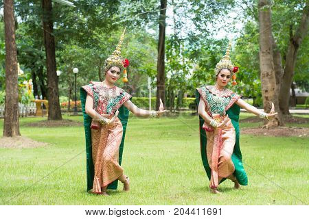 Thai traditional dress. Actors performs Thai ancient dancing Art of Khon-Thai classical masked ballet in Thailand