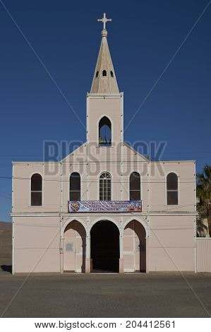 Huara, Tarapaca Region, Chile - August 21, 2017: Historic church (Iglesia Santisimo Rendentor) in the town of Huara in Tarapaca Region of northern Chile.